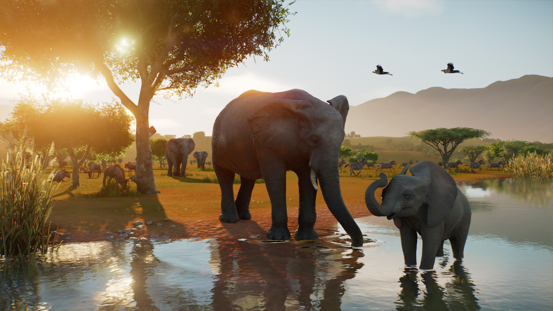 ช้างโตและลูกช้างอยู่ริมแหล่งน้ำยามเย็นใน Planet Zoo 2