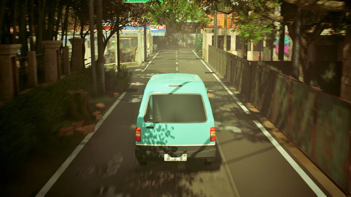 รถตู้บนถนนแคบในเมืองจากมุมกล้องด้านหลัง
